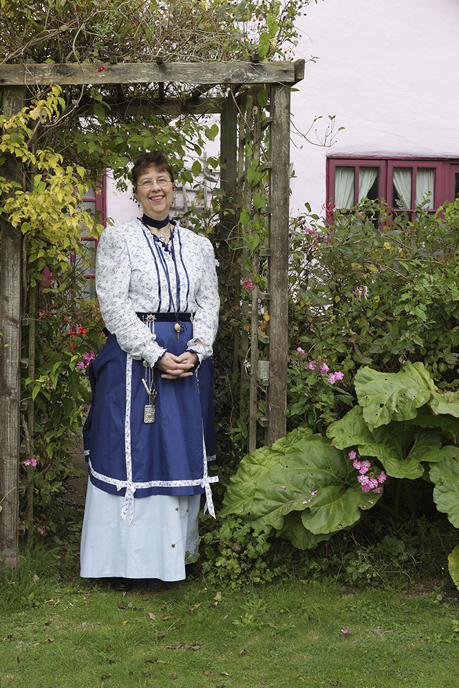 Aunt Martha standing in her garden