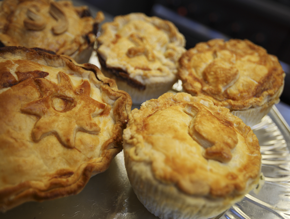 A plate of Maria's homemade pies, looking delicious!