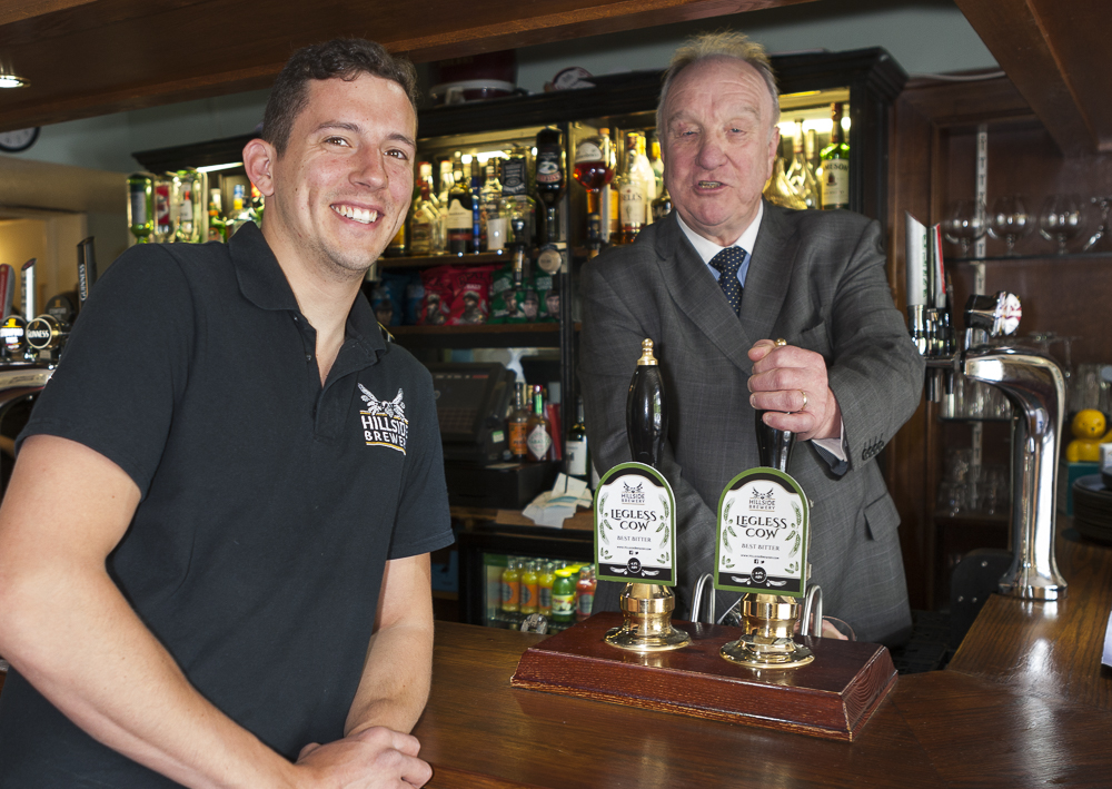 Peter Hands of The Speech House Hotel takes delivery of Hillside Brewery Legless Cow ale, by Paul Williamson.